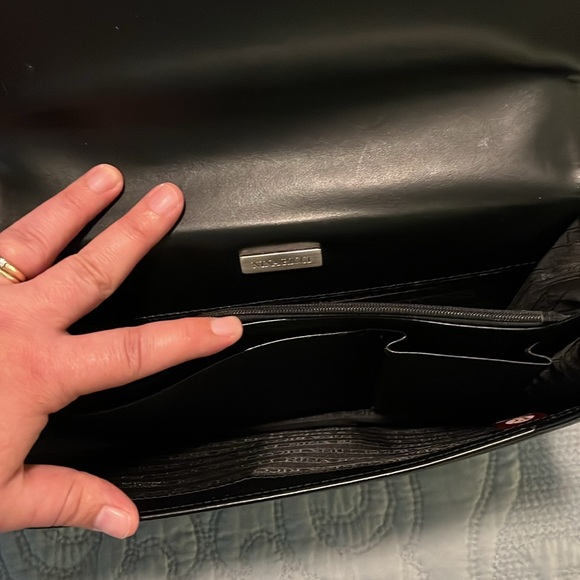 Nina Ricci Structured Black Leather Silver Hardware Locking Clutch/Wristlet